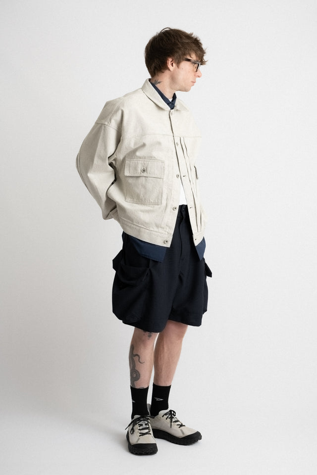 meanswhile Japan SS24 men's collection fade denim pleated sleeve blouson jacket off white Calculus online shop Canada