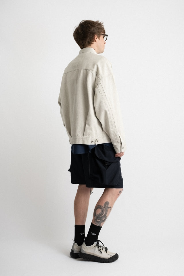 meanswhile Japan SS24 men's collection fade denim pleated sleeve blouson jacket off white Calculus online shop Canada