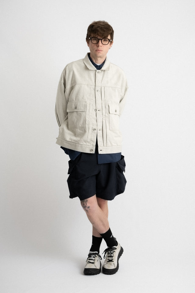 meanswhile Japan SS24 men's collection fade denim pleated sleeve blouson jacket off white Calculus online shop Canada