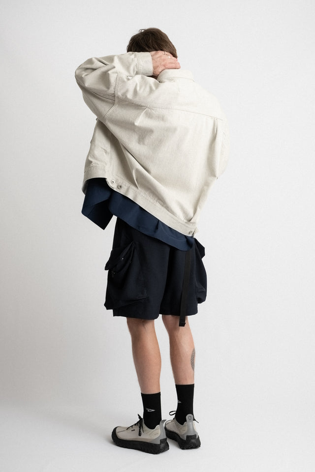 meanswhile Japan SS24 men's collection fade denim pleated sleeve blouson jacket off white Calculus online shop Canada