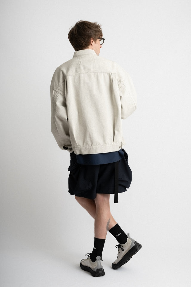 meanswhile Japan SS24 men's collection fade denim pleated sleeve blouson jacket off white Calculus online shop Canada