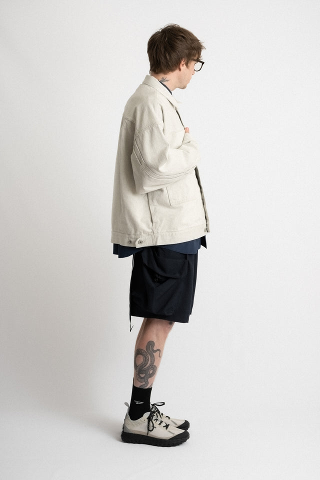 meanswhile Japan SS24 men's collection fade denim pleated sleeve blouson jacket off white Calculus online shop Canadameanswhile Japan SS24 men's collection fade denim pleated sleeve blouson jacket off white Calculus online shop Canada