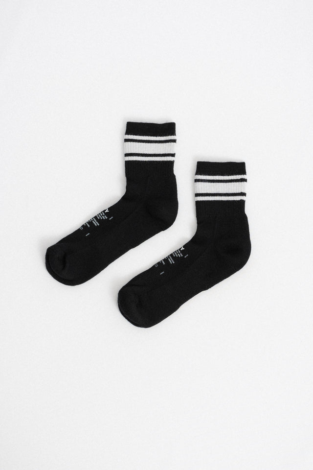 Satisfy Running Paris FW24 Men's Collection Merino Tube Socks Black Perfect Circle men's seasonal & consignment fashion shop